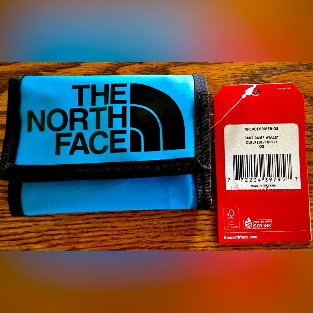 North face wallet New with tags attached.   Base camp wallet